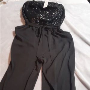 Bebe 2 pant suits size small Black with sequins
